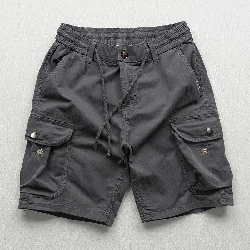 Relaxed man in comfortable Palermo cargo shorts, perfect for casual summer outings & everyday versatile wear.
