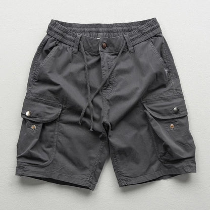 Relaxed man in comfortable Palermo cargo shorts, perfect for casual summer outings & everyday versatile wear.