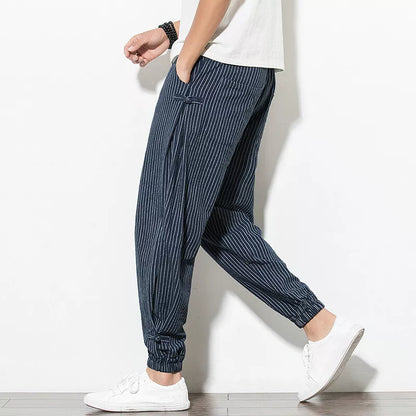 Modern men's pinstripe joggers, offering effortless style, comfort, and a relaxed athletic fit.