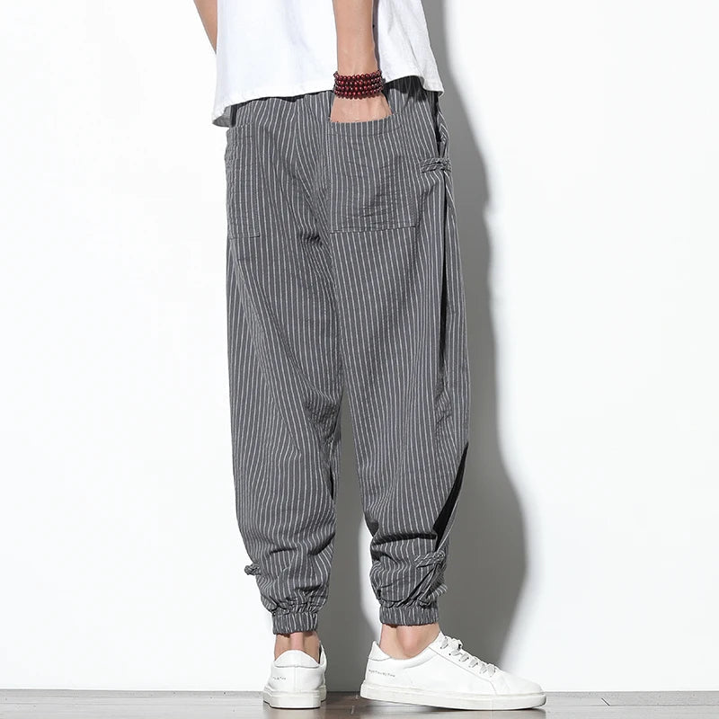 Versatile men's pinstripe joggers, great for lounging, casual outings, and athletic style comfort.