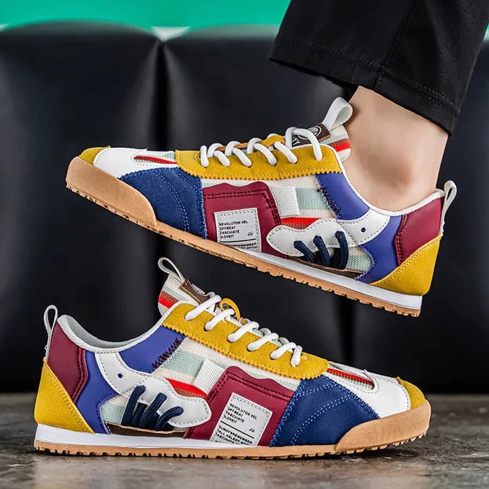 Side view of men's comfortable patchwork trail street sneakers, ideal versatile footwear for active and casual wear.