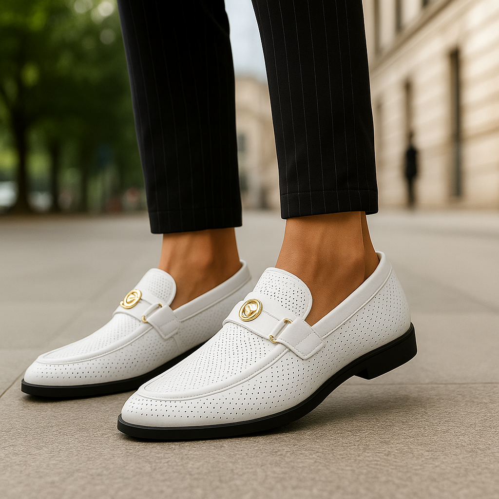 Stylish white men's perforated loafers, featuring breathable comfort & a modern slip-on design.