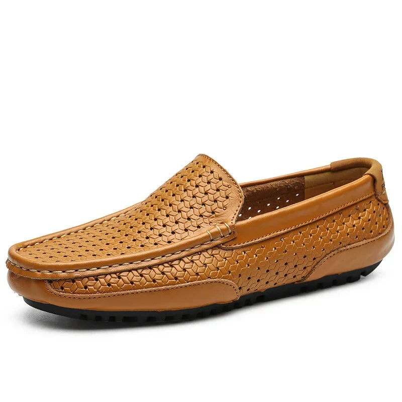 Black men's perforated slip-on loafers, sleek casual footwear for modern fashion.