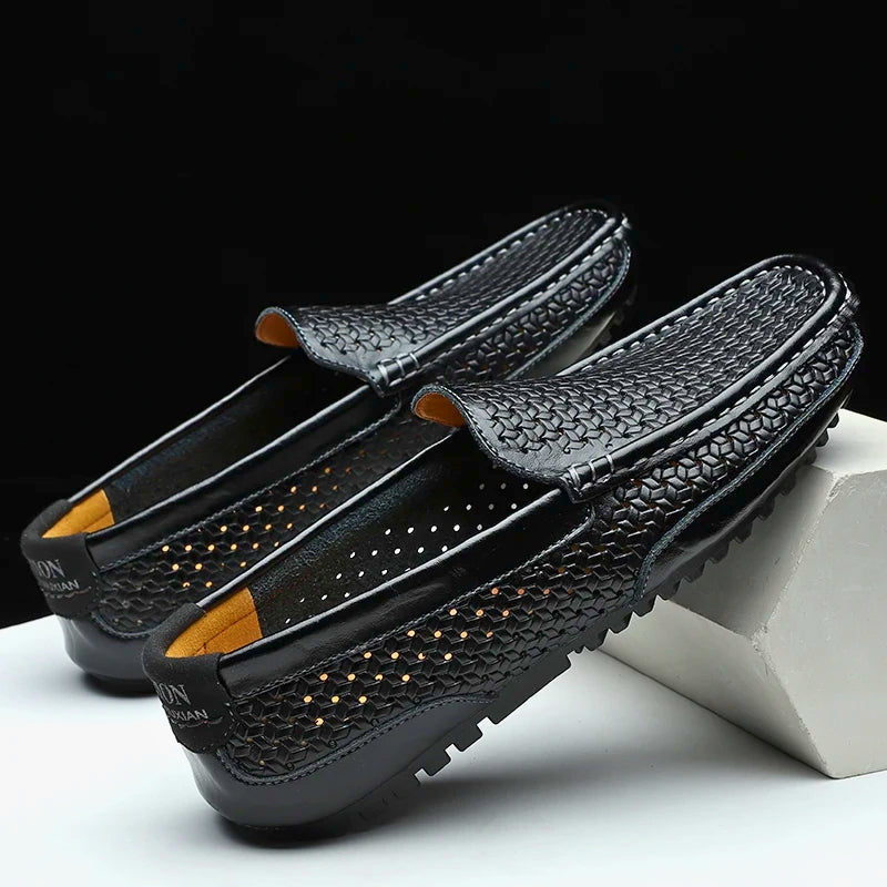 Comfortable men's slip-on loafers, featuring a breathable perforated design for easy wear.