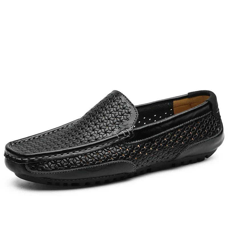Modern men's perforated slip-on loafers, a stylish choice for contemporary casual men's fashion.