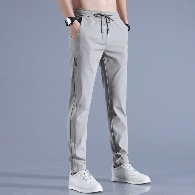 Men's performance golf pants in a classic fit, designed for comfort and flexibility on the course.