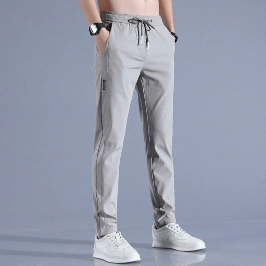 Men's performance golf pants in a classic fit, designed for comfort and flexibility on the course.