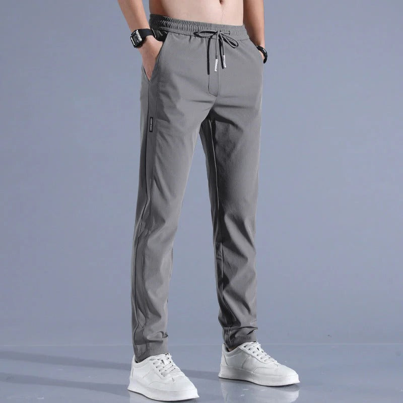 Modern fit men's golf pants, performance wear, combining style and freedom of movement for golf.