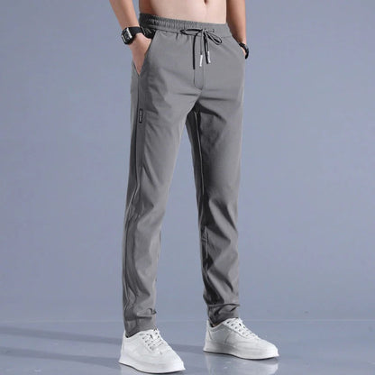 Modern fit men's golf pants, performance wear, combining style and freedom of movement for golf.