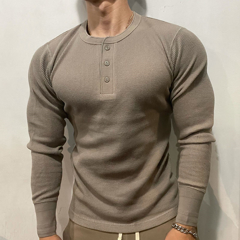Breathable men's athletic Henley muscle shirt, offering ultimate comfort for gym workouts & casual wear.