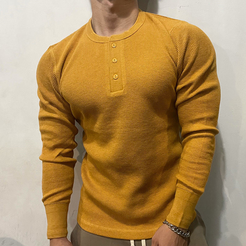 Versatile men's Henley muscle shirt, ideal for active lifestyles, sports, or comfortable everyday casual wear.
