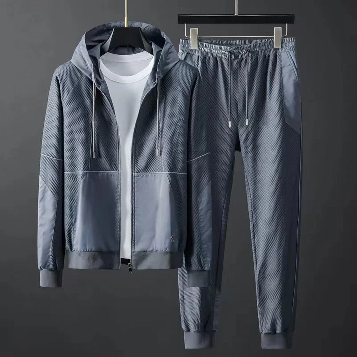 Men's performance techwear tracksuit. Ultimate comfort & modern style athletic set with tapered joggers.
