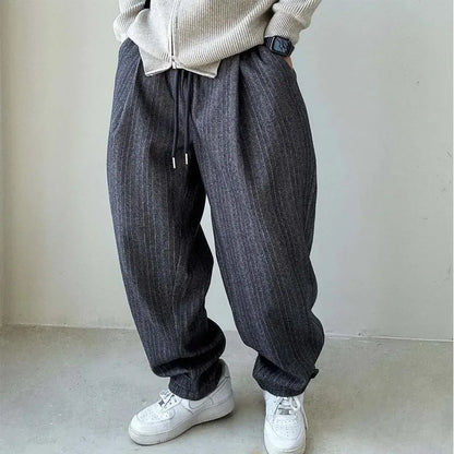 Men's pinstripe drawstring relaxed pants, comfortable casual trousers for versatile men's fashion.