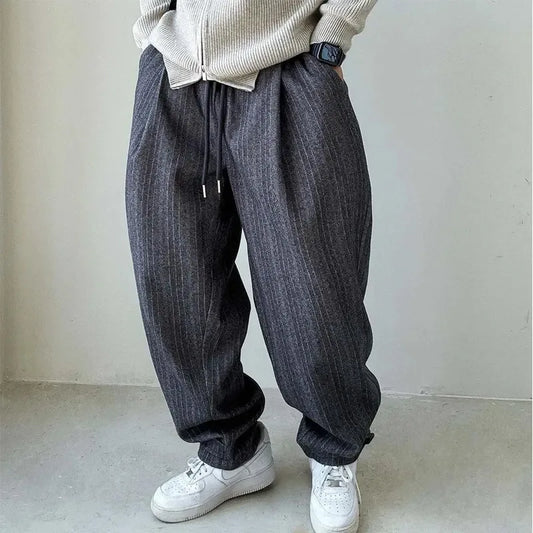 Men's pinstripe drawstring relaxed pants, comfortable casual trousers for versatile men's fashion.