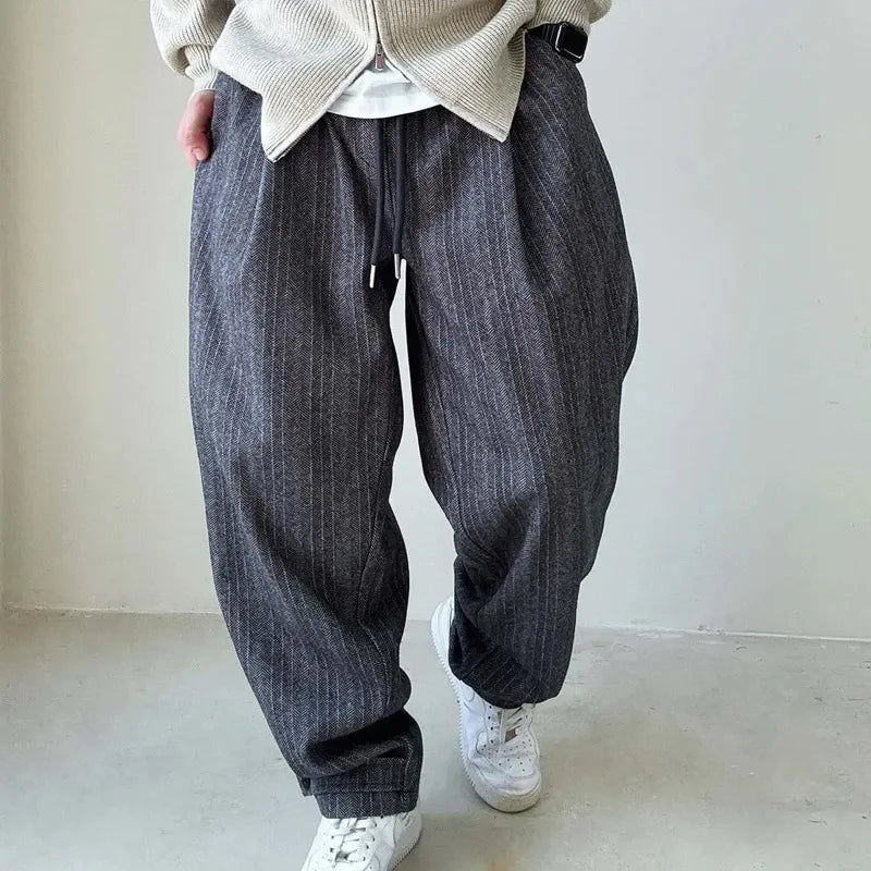 Brown pinstripe drawstring pants for men, designed for a comfortable, relaxed fit perfect for casual wear.