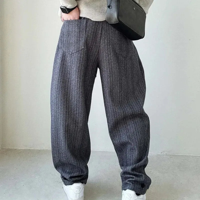 Comfortable men's pinstripe drawstring trousers, ideal for a relaxed fit and effortless smart casual styling.