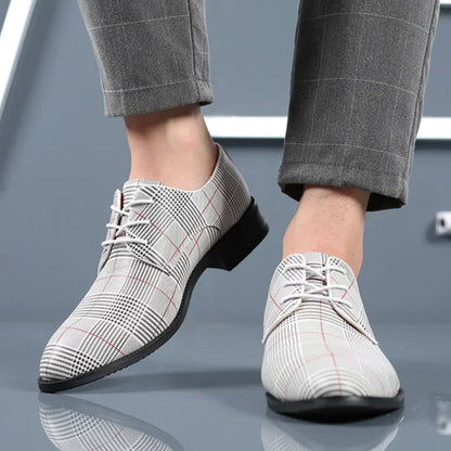 Lace-up men's oxford shoes featuring a unique plaid pattern, perfect for formal wear.