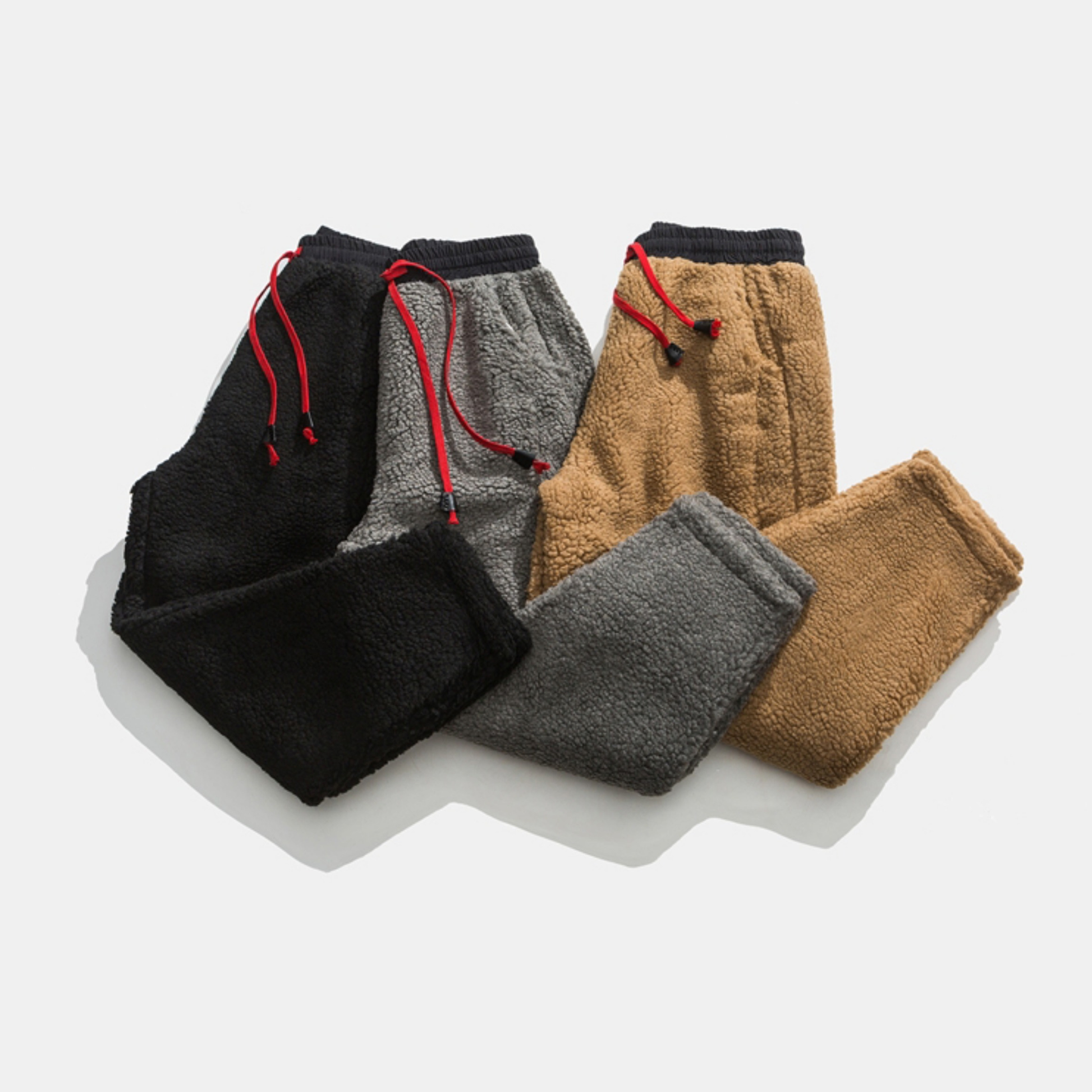 Stylish & warm men's plush sherpa fleece jogger pants, perfect for cozy winter outfits and casual comfort.
