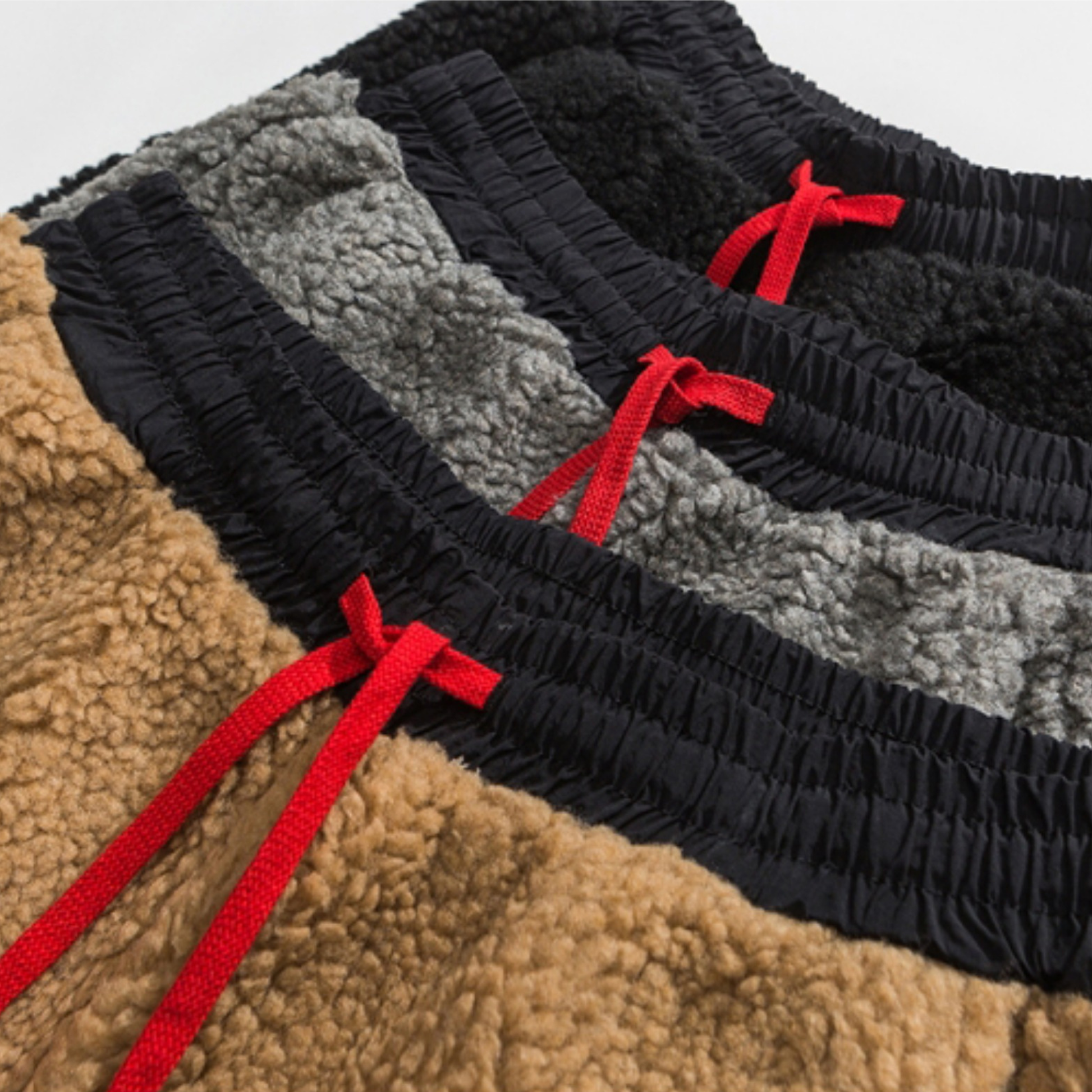 Plush sherpa fleece men's jogger pants, extra warm & cozy loungewear, ideal for winter relaxation.