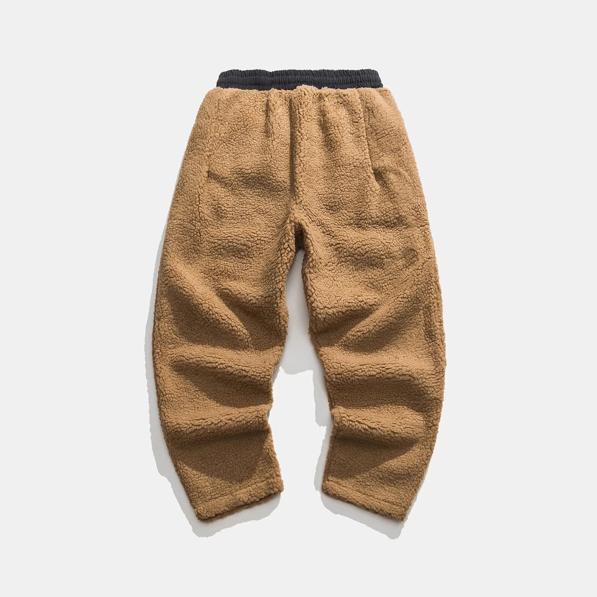 Elastic waistband & ribbed cuffs on men's plush sherpa fleece jogger pants, warm winter loungewear.
