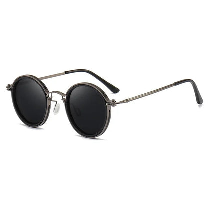 Men's polarized sunglasses for clear vision. Black metal frame, UV protection. Ideal jetset accessory.
