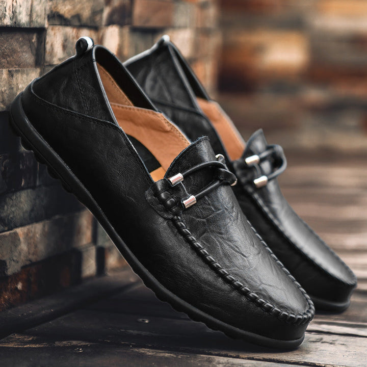 Polished men's bit loafers, classic dress shoes with a sleek metal bit, comfortable men's footwear.