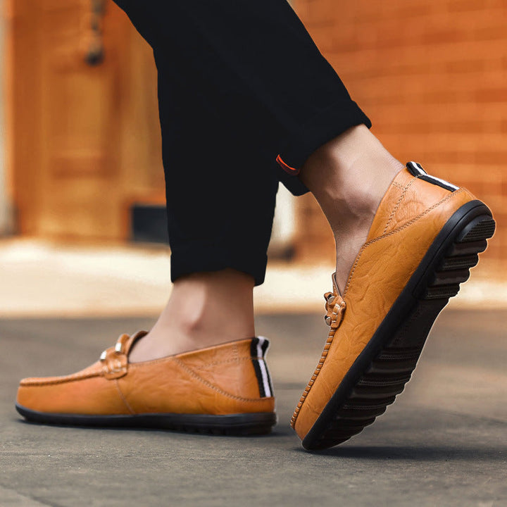 Men's polished bit loafers, a sophisticated choice for dress shoes, offering comfort and timeless style.