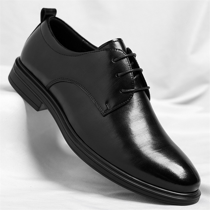 Side view of men's sleek black polished dress shoes, perfect for professional & formal occasions.