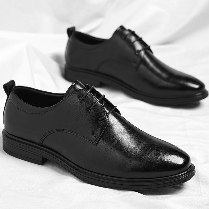 Men's elegant polished dress shoes, essential professional footwear for any formal or business setting.