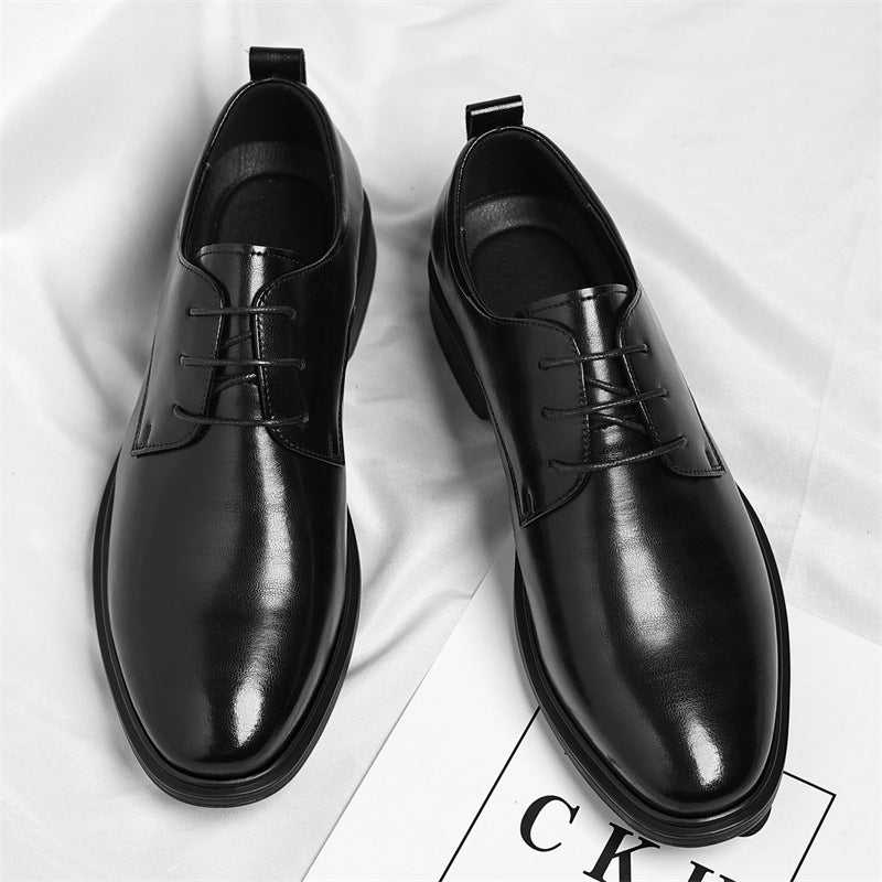 Black polished business shoes for men, combining classic style with professional office attire.