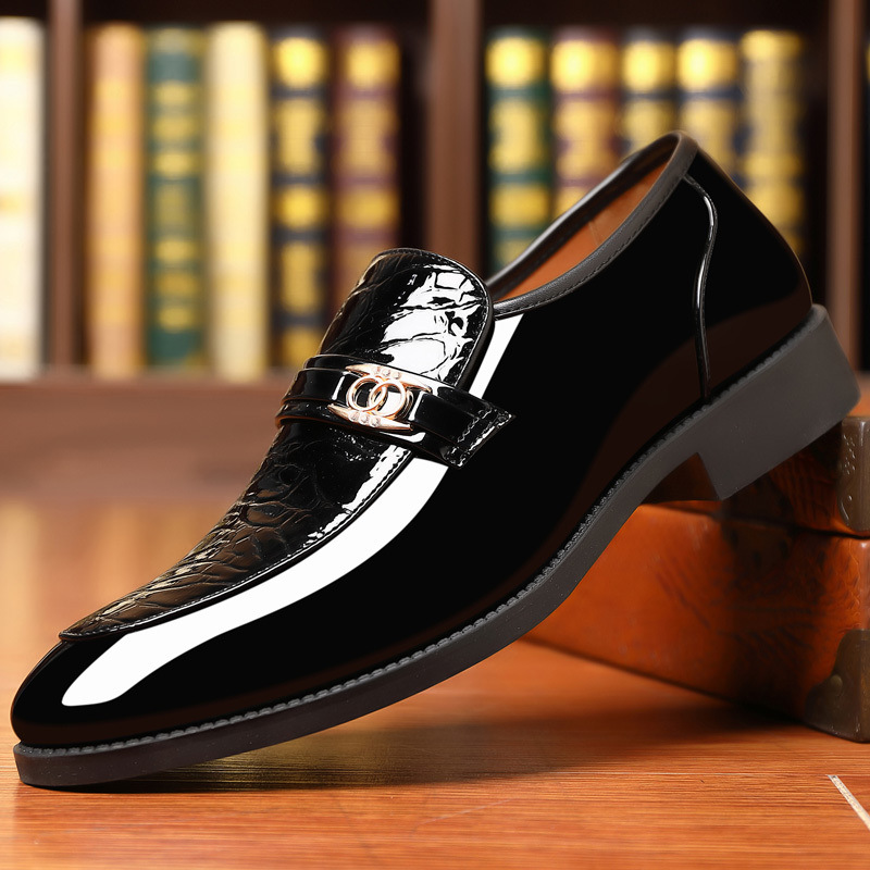 Men's polished black slip-on dress loafers with elegant croc texture & gold accent.