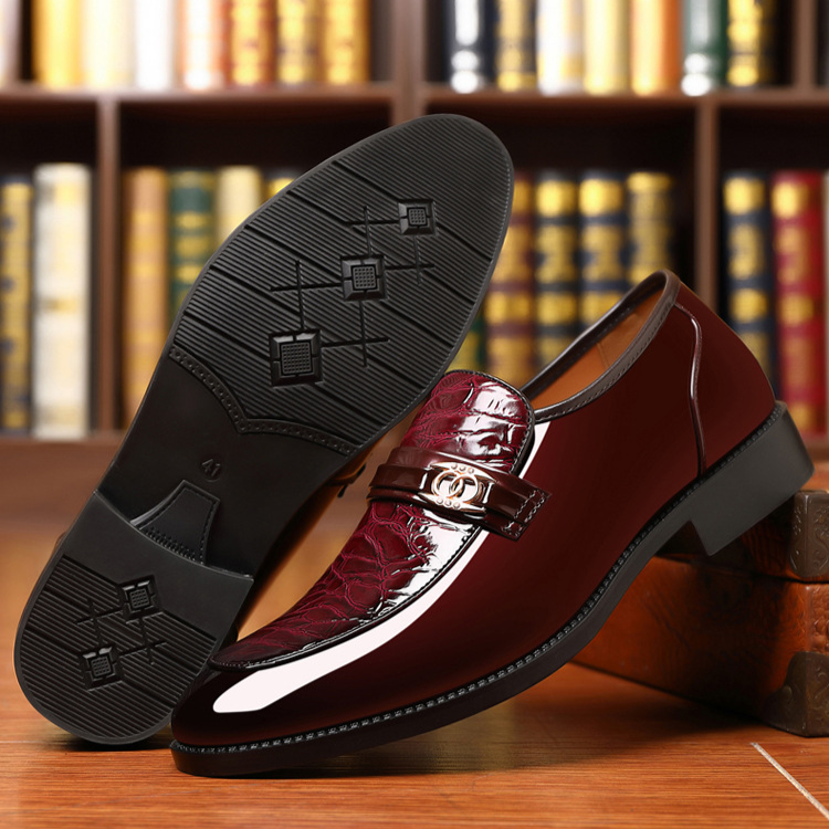 Men's elegant slip-on shoes with a polished look, croc texture, and gold detail.