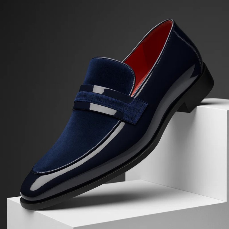 Men's polished Italian penny loafers, perfect for dress or smart casual wear.