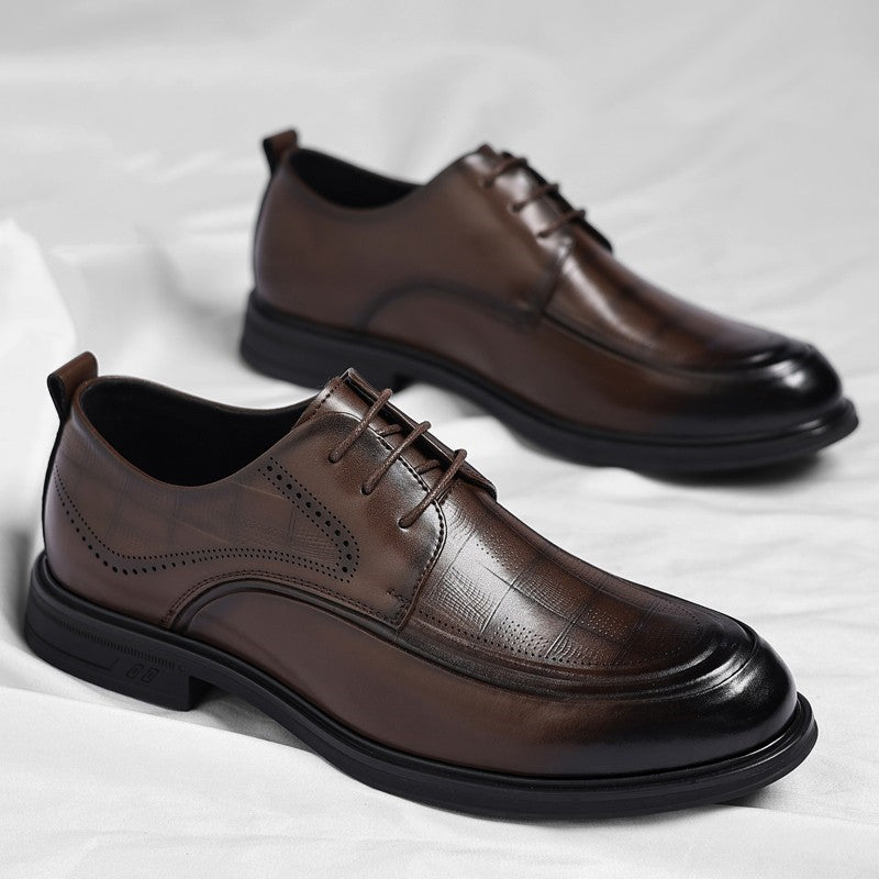 Close-up of sleek men's polished brogue dress shoes with classic perforations for a refined look.