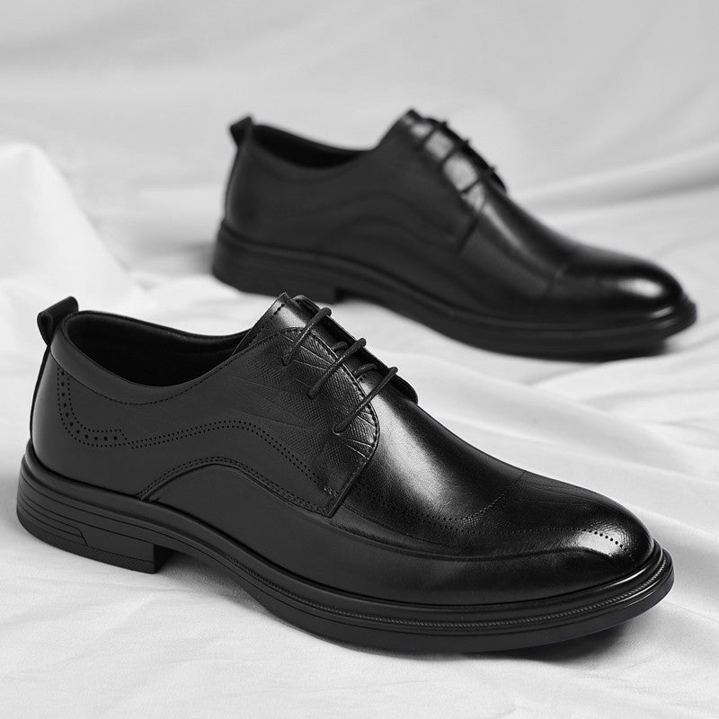 Side profile of classic men's polished brogue dress shoes, showcasing their timeless professional style.
