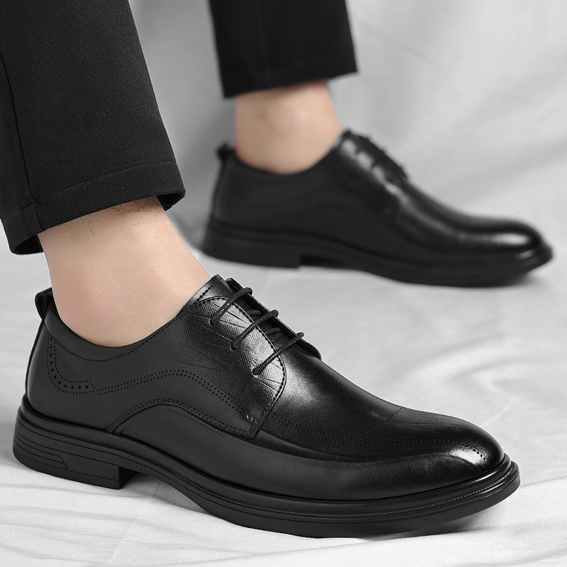 Sophisticated men's polished brogue dress footwear, embodying professional style and modern elegance.
