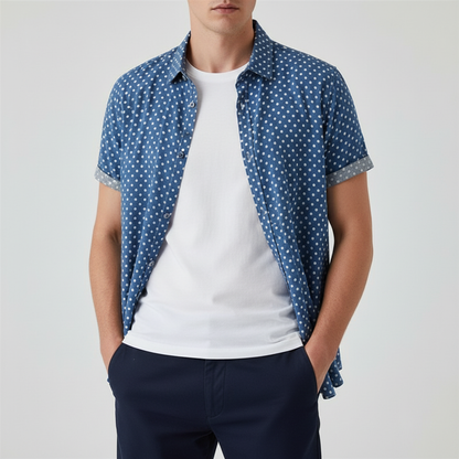 Close-up of the polka dot pattern on men's short-sleeve summer shirt, casual fashion.