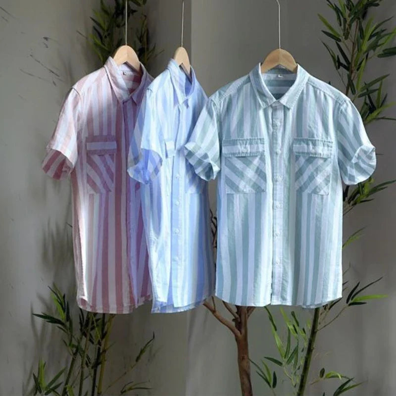 Tailored men's short-sleeve button-up shirt with classic stripes & chest pocket. Perfect for resort and vacation wear.