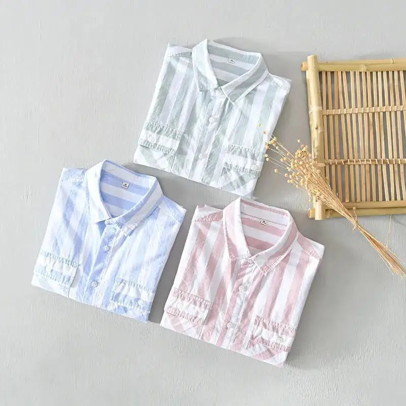 Men's casual striped short-sleeve shirt. Button-up design with chest pocket, great for summer fashion & resort style.