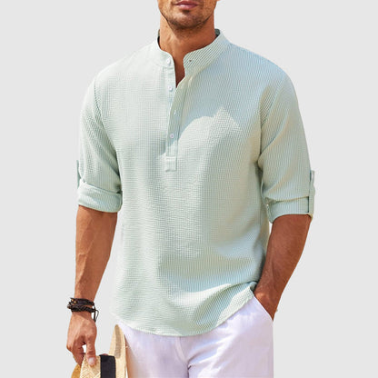 Comfortable men's long-sleeve Henley for summer vacations. Relaxed fit casual shirt, perfect for warm weather.