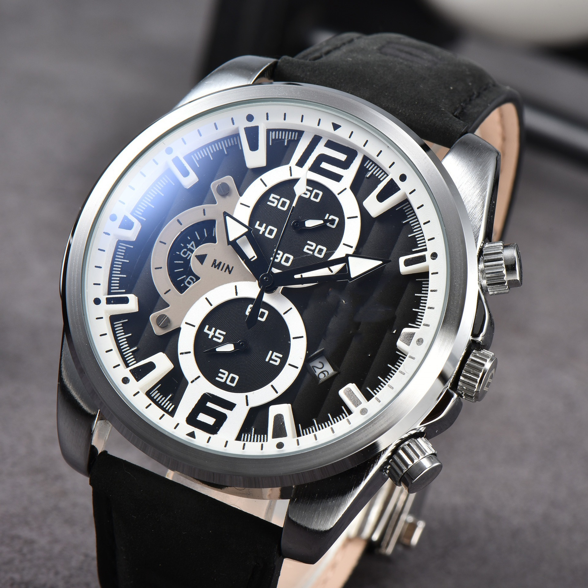 Stylish men's chronograph sport watch featuring a durable stainless steel case and a comfortable leather strap.