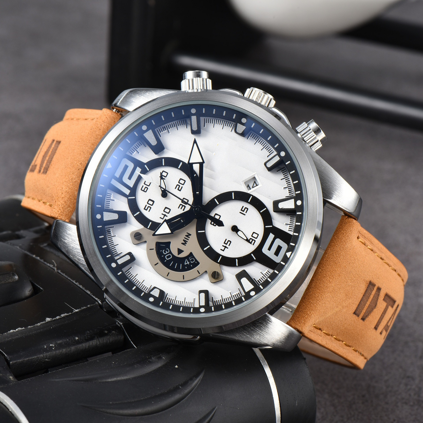 Elegant men's watch: precision chronograph with a sleek black dial, date window, and polished stainless steel.