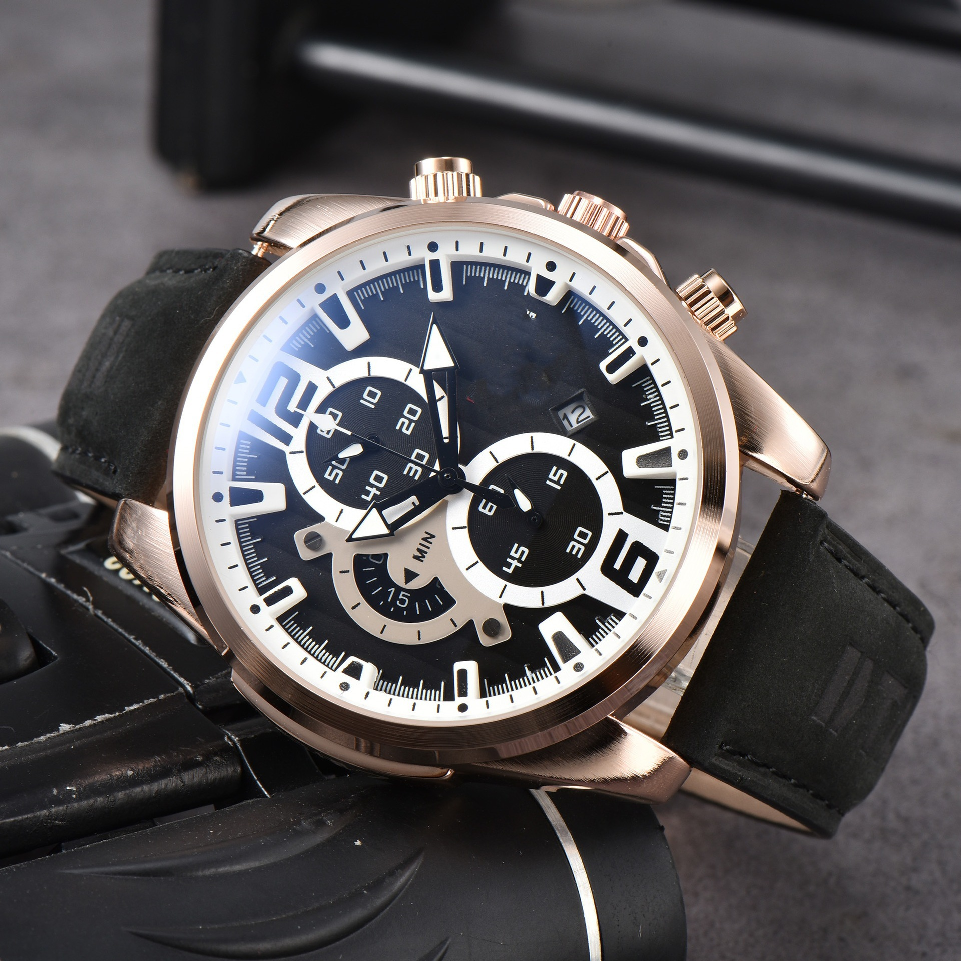 High-quality men's accessory: A precision chronograph watch with a robust stainless steel case and leather band.