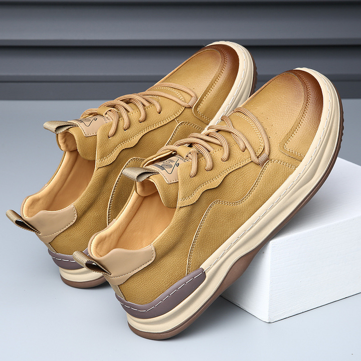 Tan men's comfort walking shoes, stylish everyday athletic sneakers.