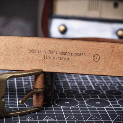 Full length view of a men's classic brown cowhide leather belt. Durable waist accessory for timeless style.