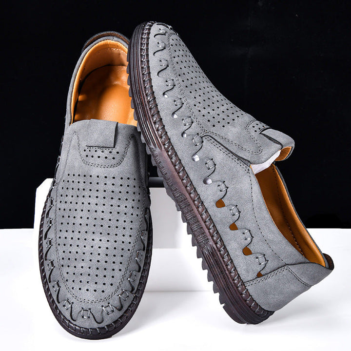 Modern men's cowhide leather slip-on loafers, moc toe style, comfortable for casual and everyday fashion.