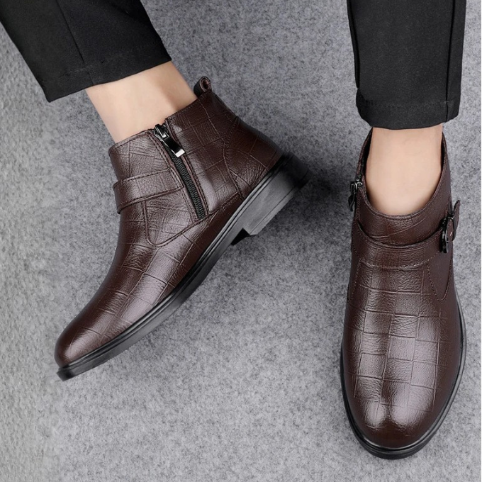 Black full-grain leather men's casual boots with secure side zipper & adjustable buckle. Durable and comfortable.