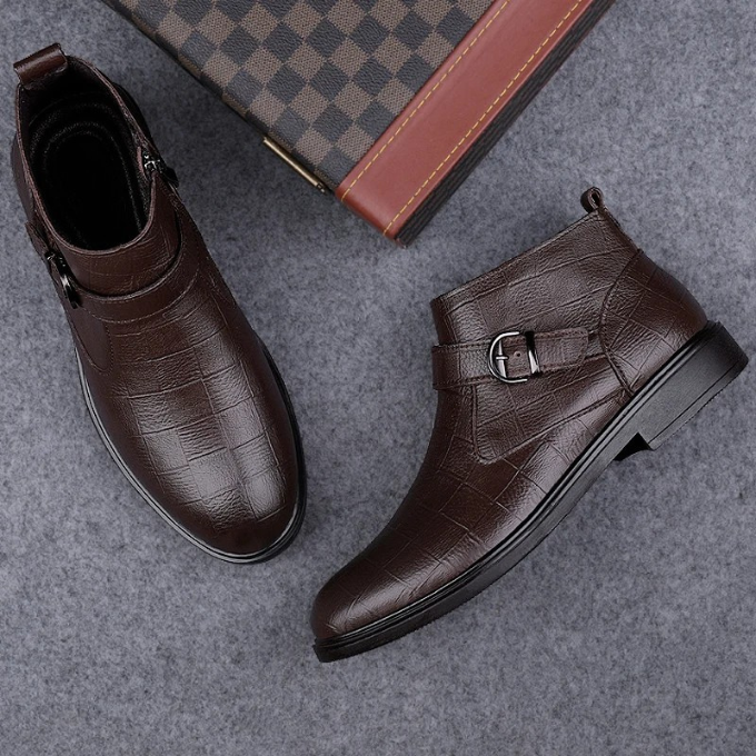 Full-grain brown leather men's boots, designed for comfort & durability, featuring practical zip & stylish buckle.