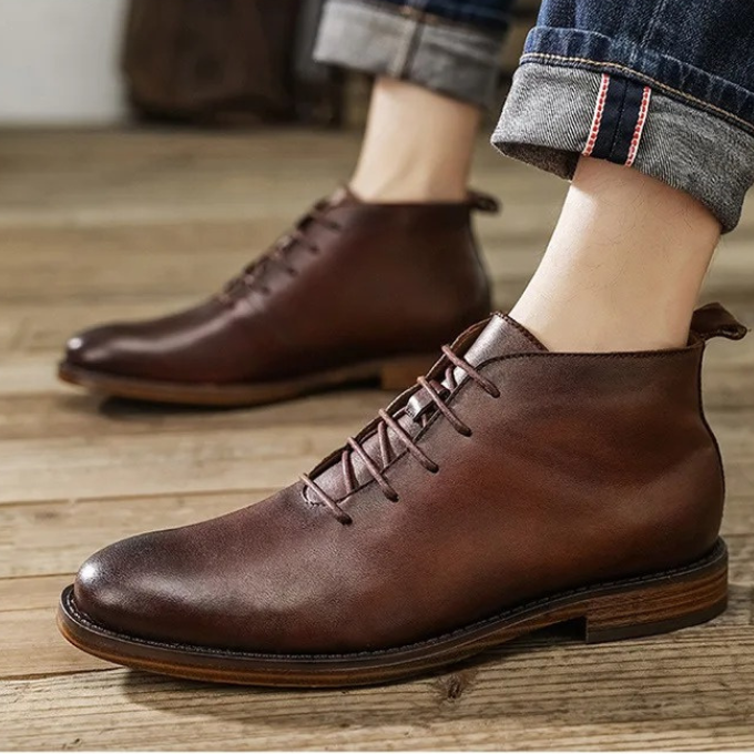 Stylish men's brown leather dress boots, perfect for formal events or elegant casual wear.