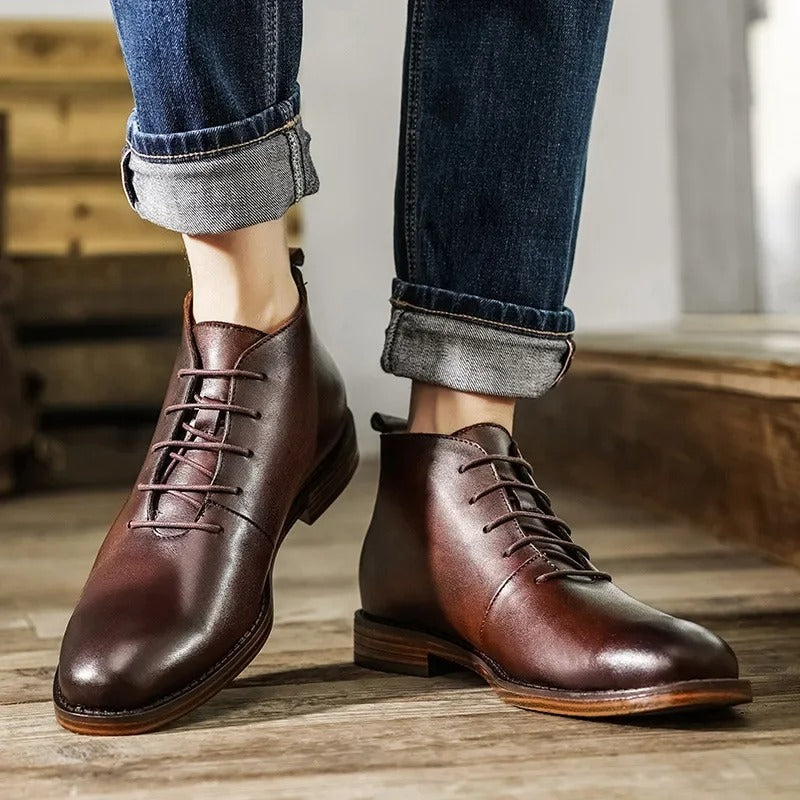 Classic men's black leather comfort boots, durable and versatile for office to evening.